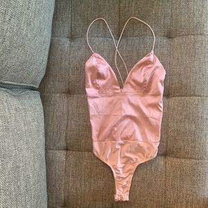 Pink silk bodysuit